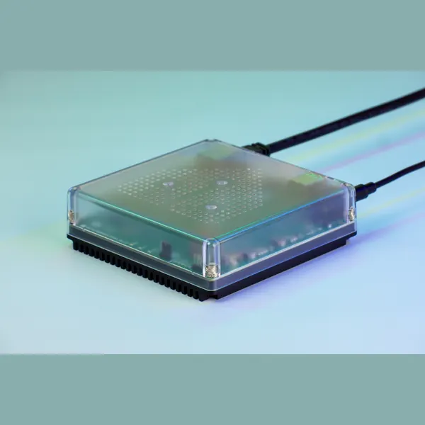 Home Assistant Green hub, a small clear-topped box