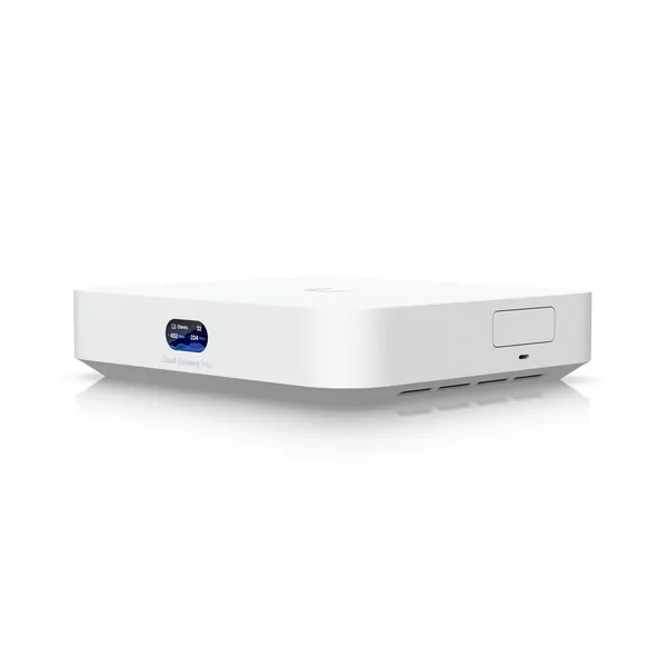 UniFi Cloud Gateway Max, a small white desktop router
